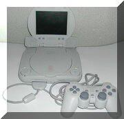 PS one with LCD screen and a DualShock controller